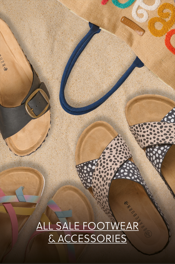 Assorted women's sandals and flip-flops laid out on a beach towel – featured in the All Sale Footwear & Accessories section